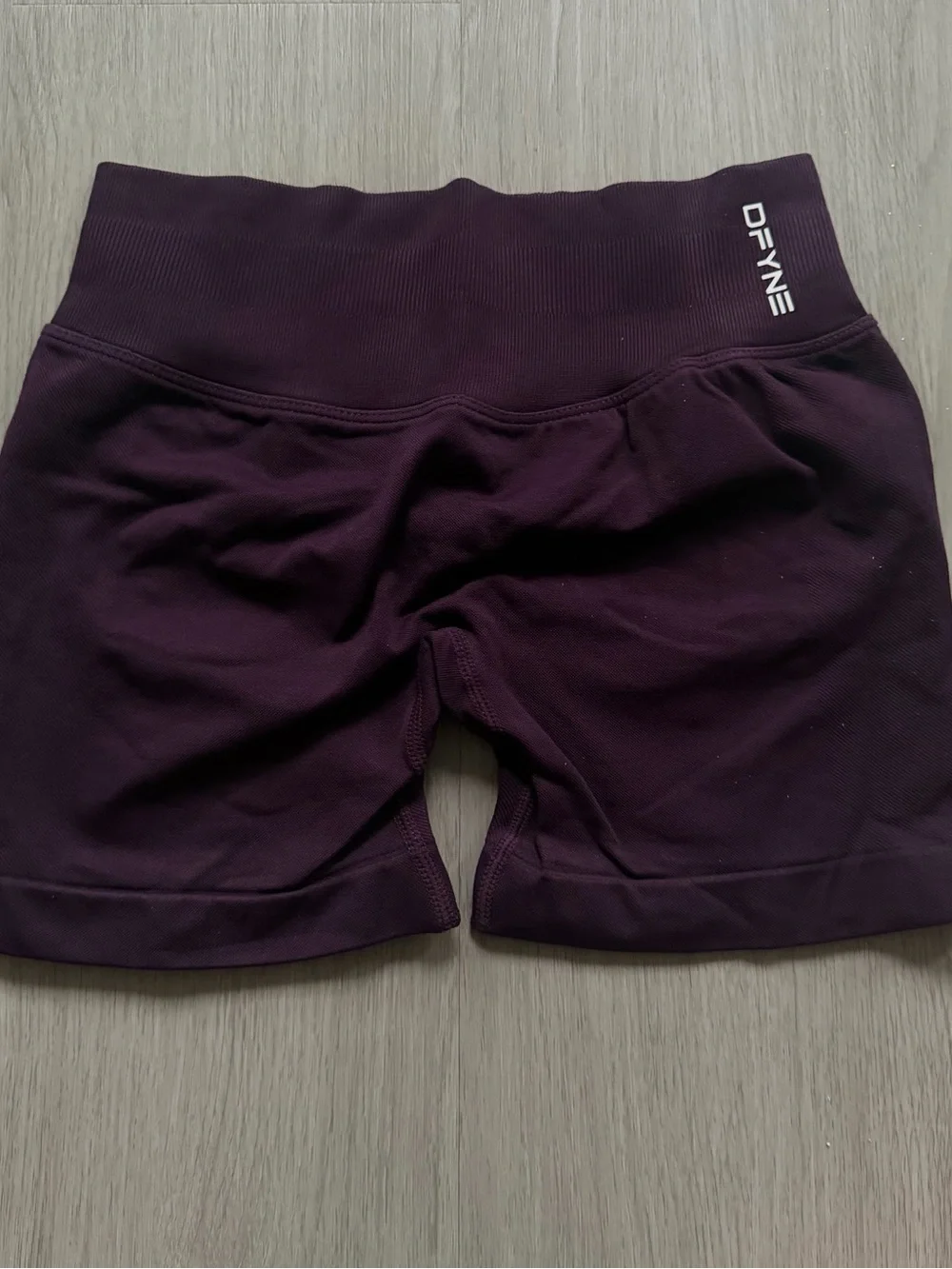 DFyne purple impact sports bra and shorts set